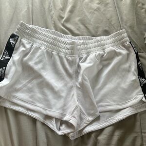 White adidas shorts. Size small